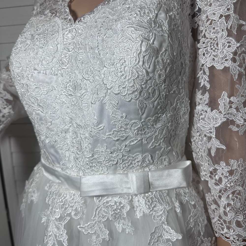 White Sweetheart Bishop Sleeve Wedding Gown